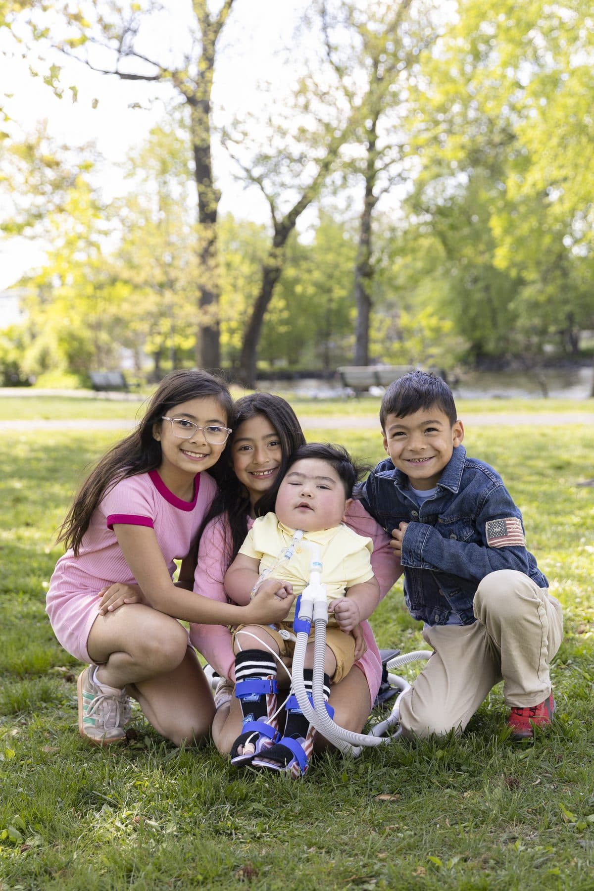 Ace is pictured with his siblings.