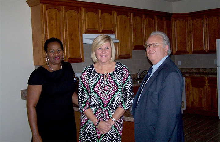 Fanwood Mayor Colleen Mahr (center); Geraldine Smith, the scheduler for Assemblyman Gerald Green; and Sid Blanchard, CAU executive director, tour the interior of the new facility.