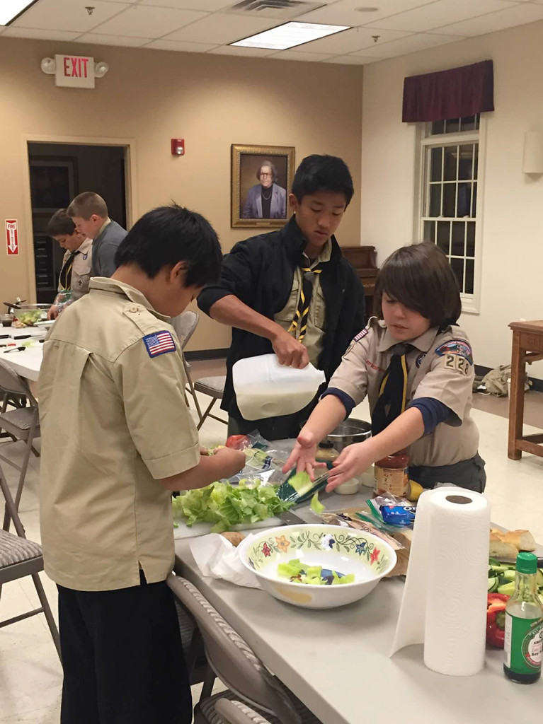 (above) Troop 228’s cooking competition was held at Codington Hall on October 26, 2015. The scouts were divided into groups and given certain ingredients to make into an appetizer, main meal and dessert. It was a lot of fun! The boys shown here are (l-r): Bryan Shangguan, Ethan Tu and Aiden Frassinelli.