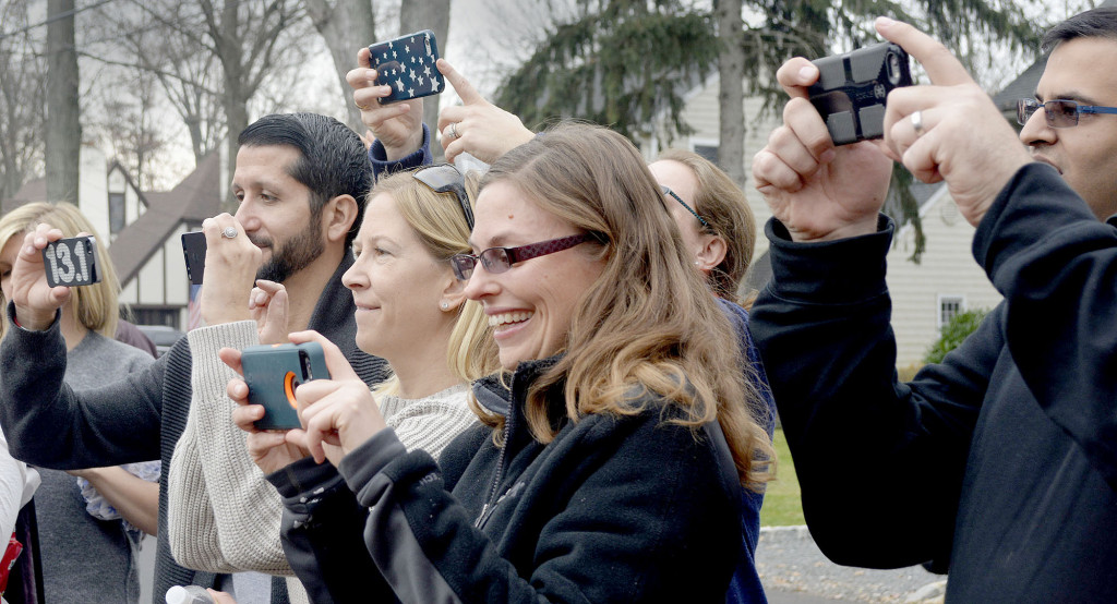 (above) Parents line up to shoot pictures of their kids with Santa during the Fanwood Fire Department’s "Santa run".