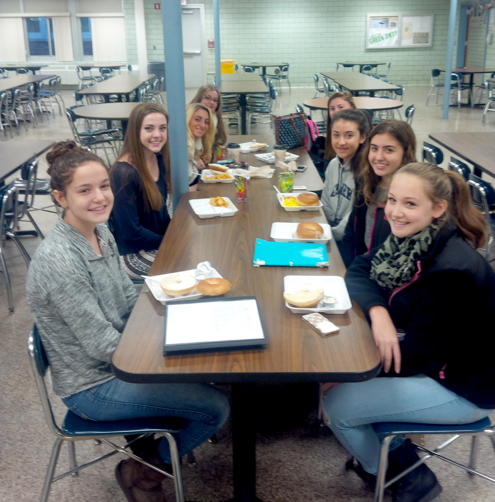 (above) The Gymnastics Team enjoys breakfast as a reward for winning the 2015 Fall G.P.A. Challenge.