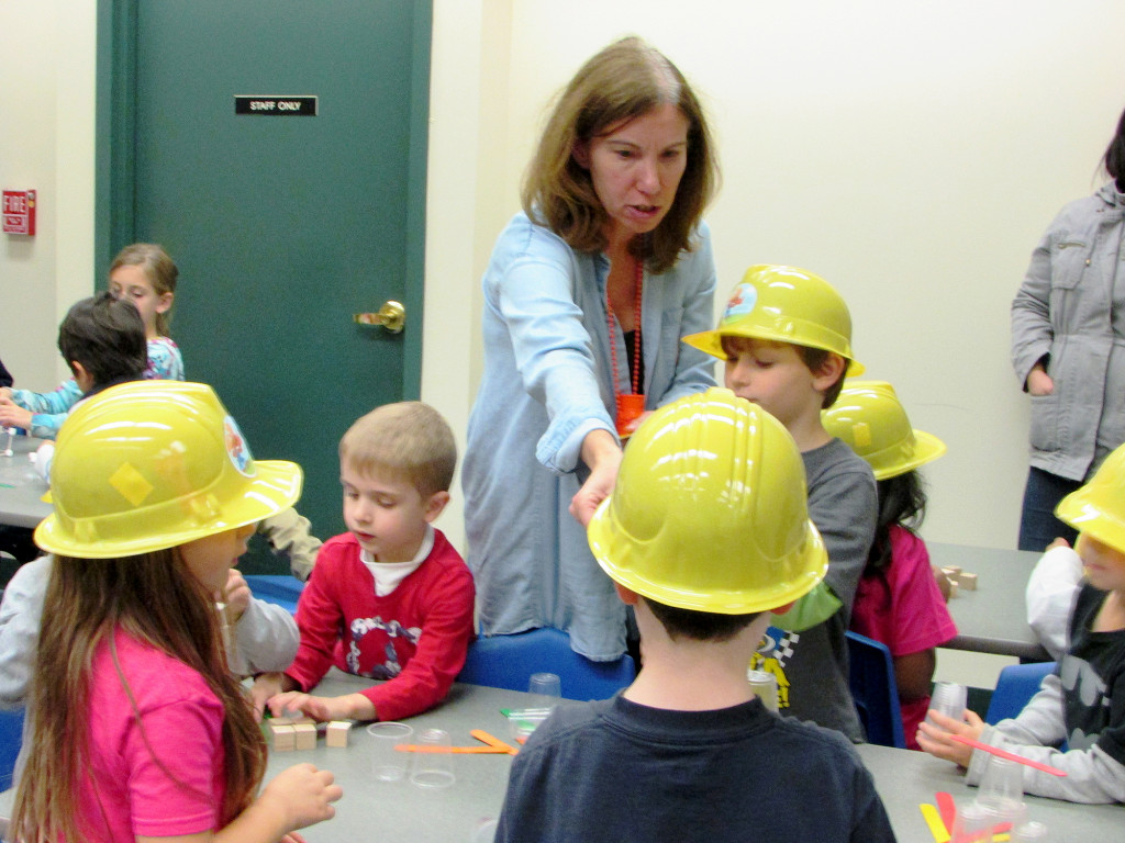 (above) the author interacting with the children as they explore building.