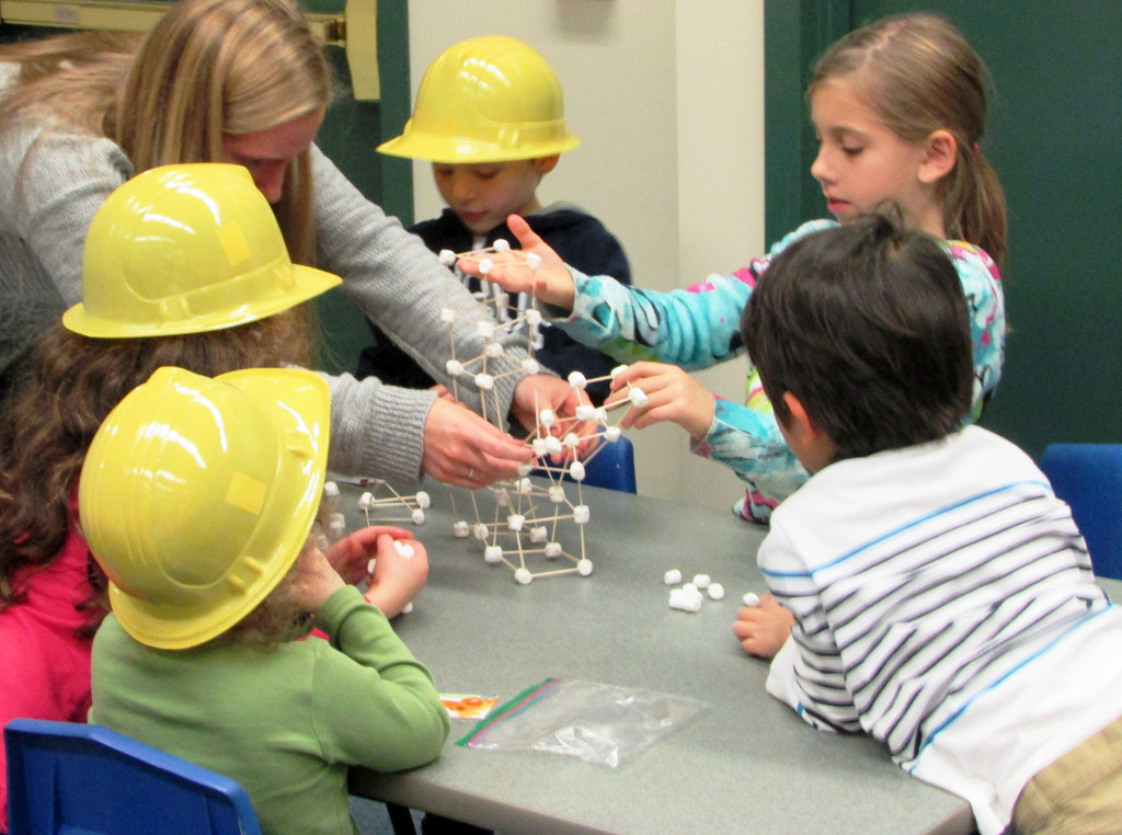 (above) Danica Lee is shown building with toothpicks and marshmallows.