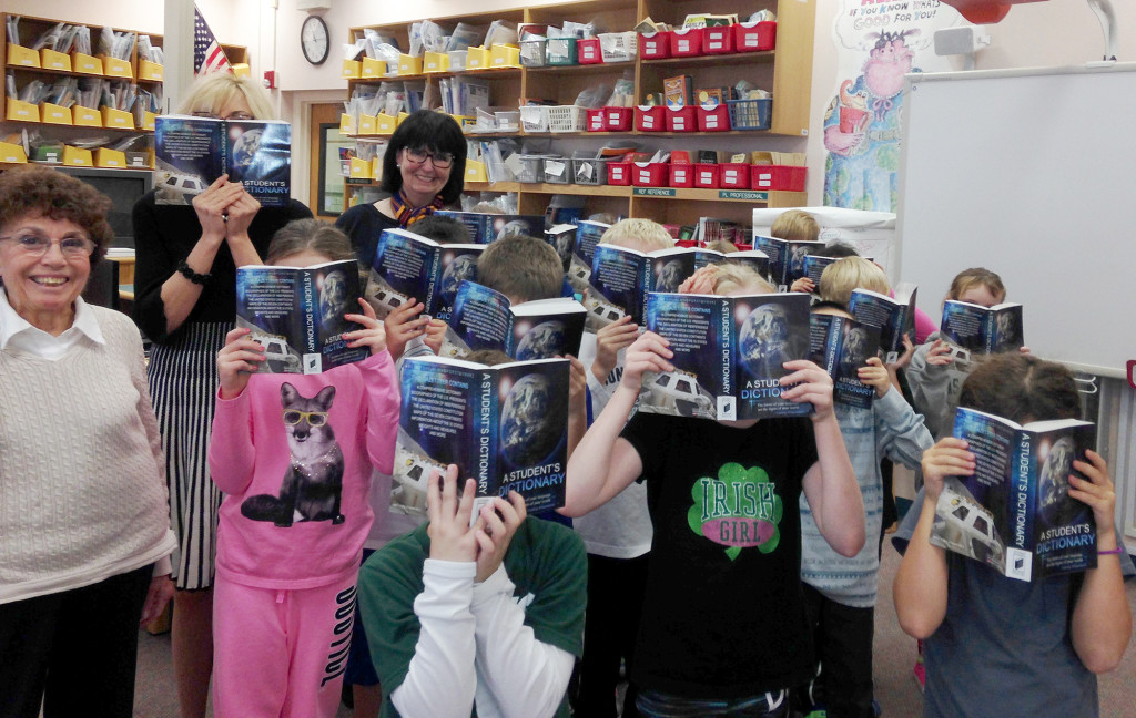 (above) Pam Steiner, Linda Sausville, and students looking up our U.S. Presidents.