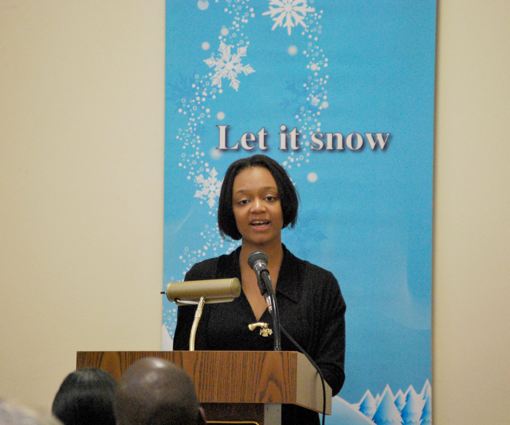 (right) Junior Sephora Delice delivers passage of speech in French.
