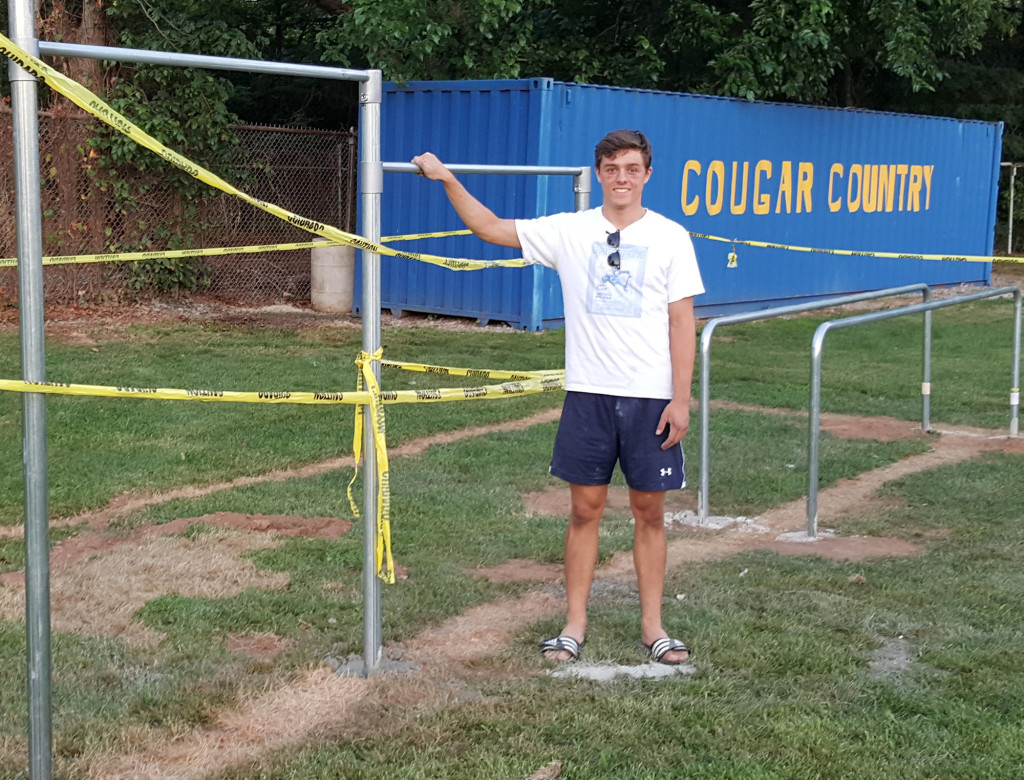 (above) Matt Capone stands proudly in front his Memorial Field Eagle Scout project.