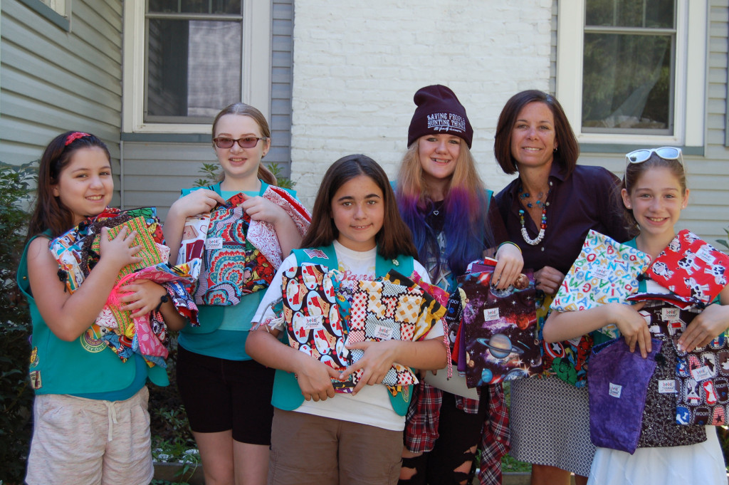 (above) The girls presented the finished bags to Stephanie (l-r): Tess, Nicole, Alyssa, Casidi, Stephanie and Lillian, Not pictured: Kaysen.