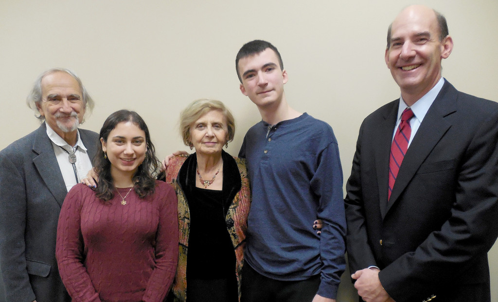 (above, l-r Maier Friedman, husband of Tova Friedman; WHRHS English Teacher Maggie Violette-Birnberg, who is a neighbor of the Friedmans; guest speaker Friedman; student Joseph Denisco; and Principal George Alexis.