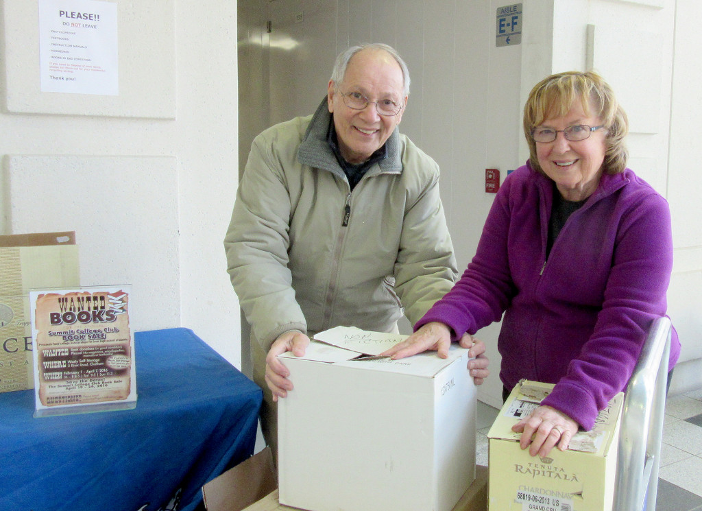(above) Bernie and Betty De Guzman packing up book donations at Westy's Self Storage.