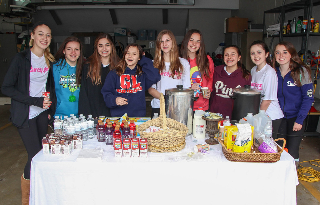 (above) Mountainside Girl Scouts sell baked goods to raise money for the American Cancer Society.