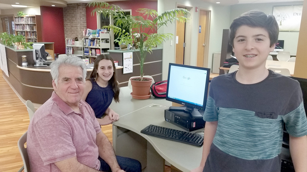 (above) Alison Schwartz and Joseph Marchese assisting Mr. Joe Pires.