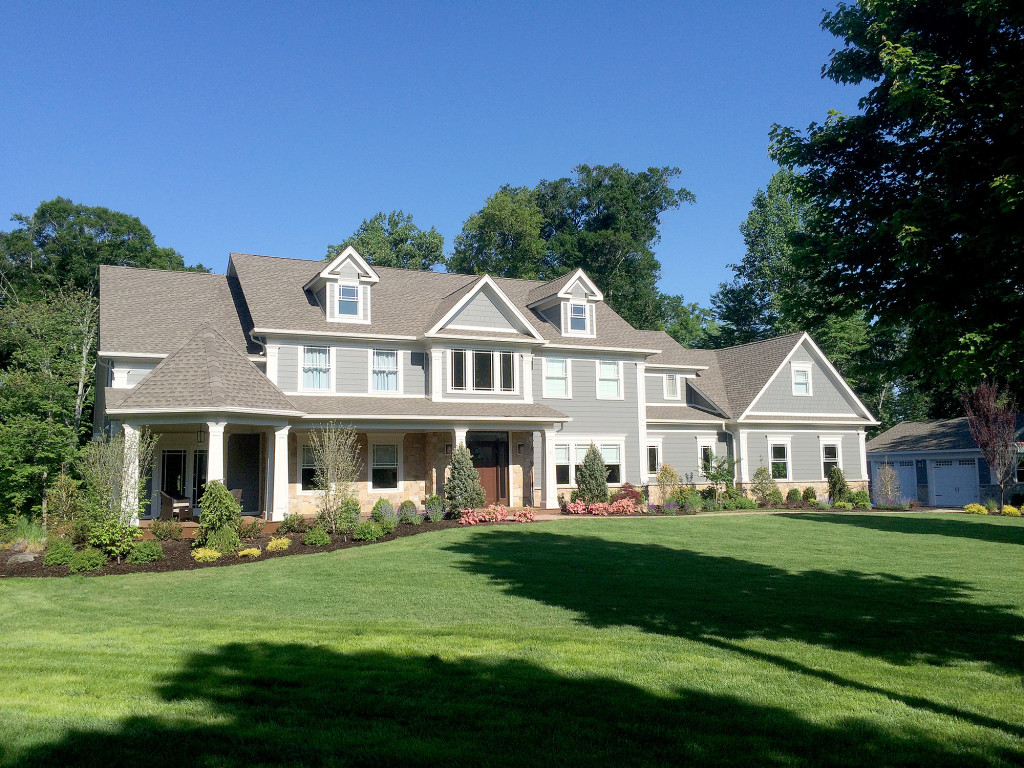 (above) This sprawling contemporary home featured on the May 7 Tour of Notable Hoes embodies the vision of its owners who redesigned and enlarged the footprint of a demolished dwelling. Replete with custom details, an over-sized kitchen and luxurious amenities, it is aimed at entertaining and family living.
