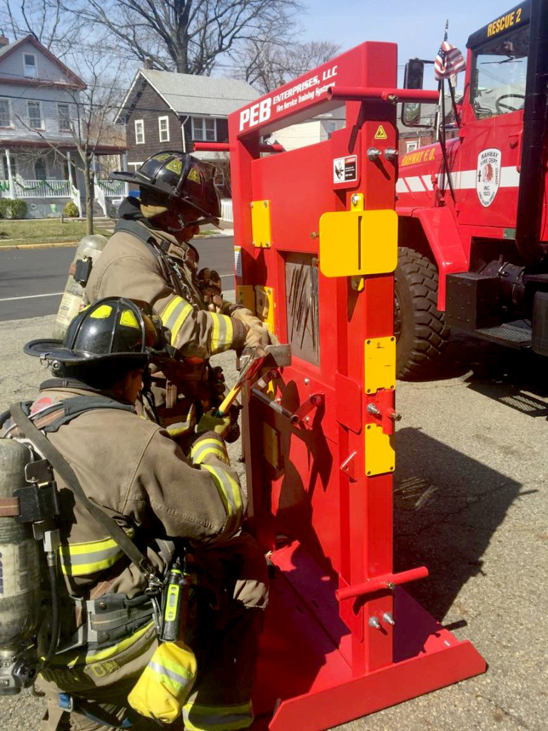 (above, l-r) Training are Captain Brian Thornton and Firefighter Rahaman Thorpe.