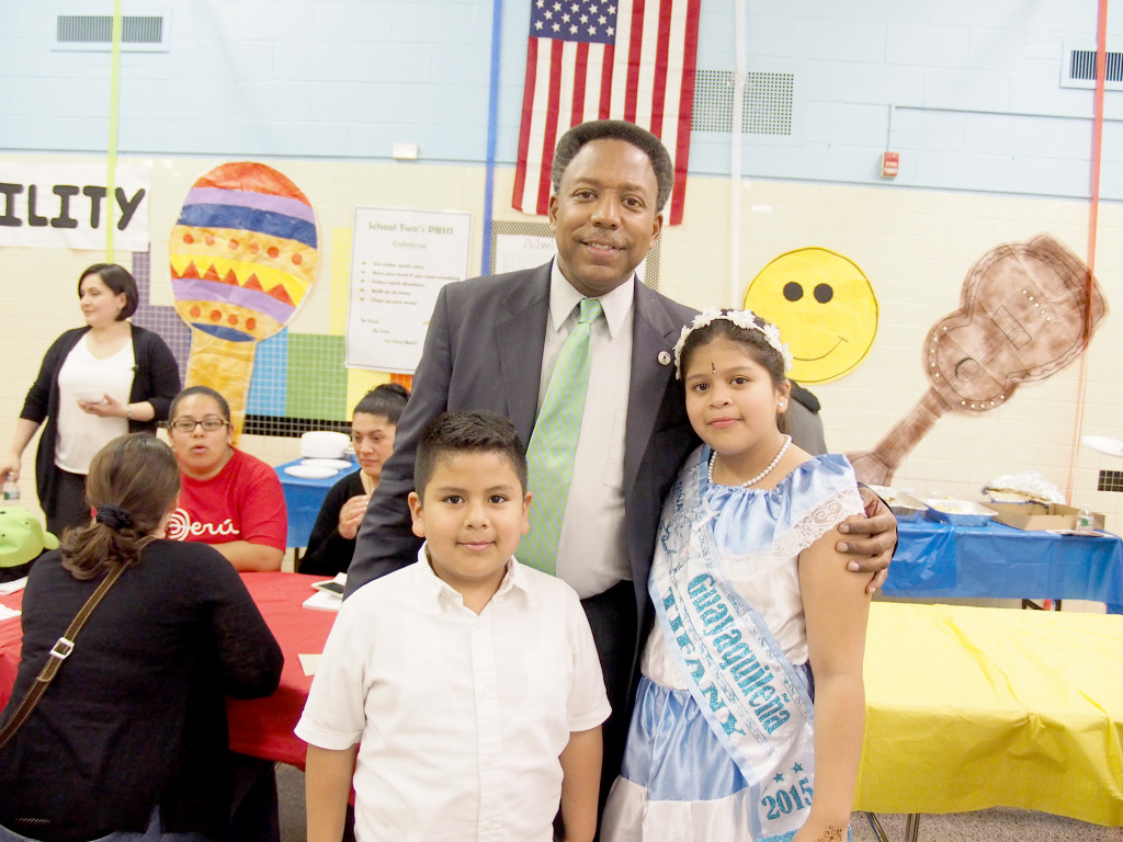 (above) Mayor Derek Armstead enjoyed learning about the diverse history of the countries. Educating the Mayor is Tiffanny Jerez who is a 5th grader at Sch. 2 and her brother Peter Jerez who is a 2nd grader.