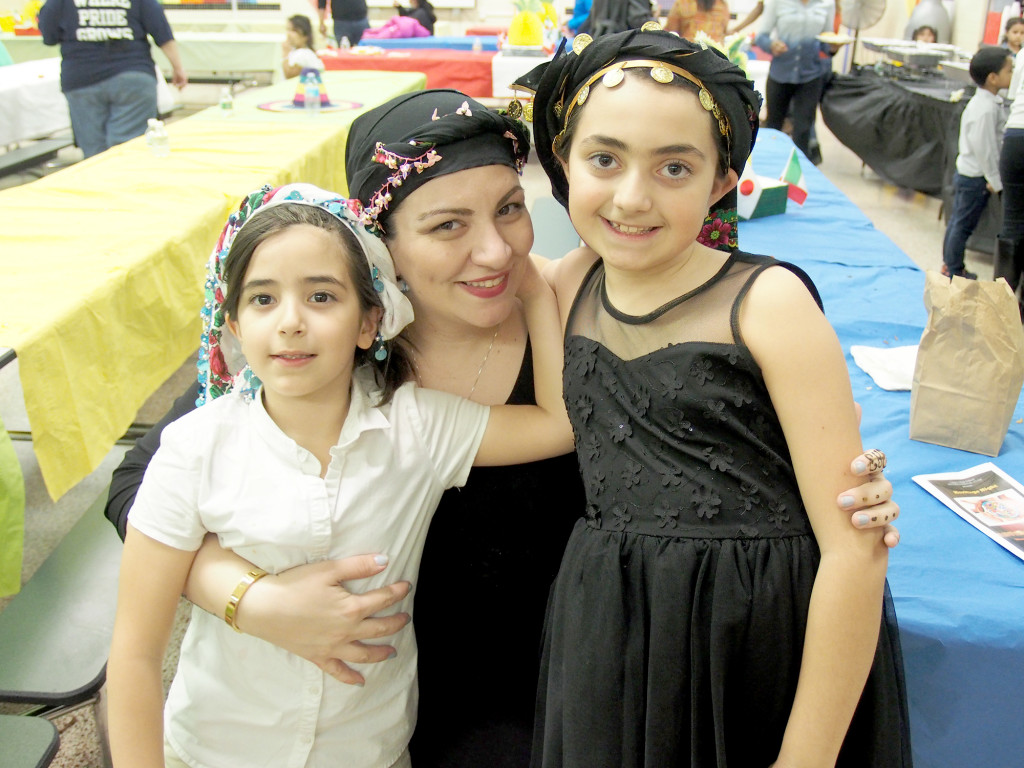 (above) Alexia Gutierrez a Kdg students at School No. 2, sister Katerina Gutierrez a 4th grader, and their mom Panagiota Vitoroulis a 3rd. grade teacher at Linden School No. 2 celebrate Greece as a family.