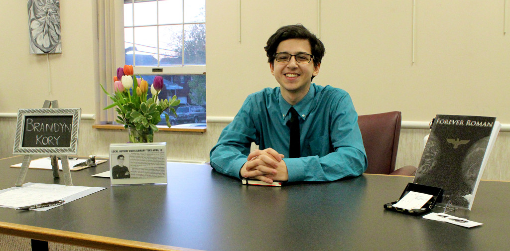 (above) Author Brandyn Kory discusses his new book, Forever Roman at The Kenilworth Public Library.