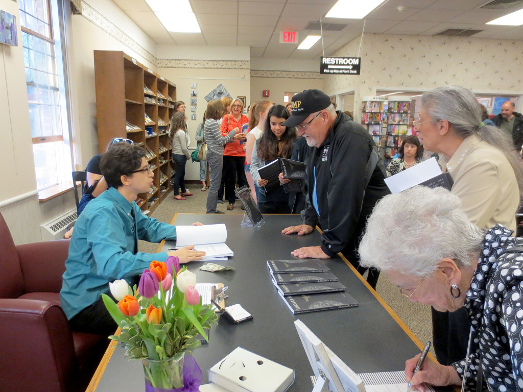 (above) Author Brandyn Kory signed copies of his book at the conclusion of this program.