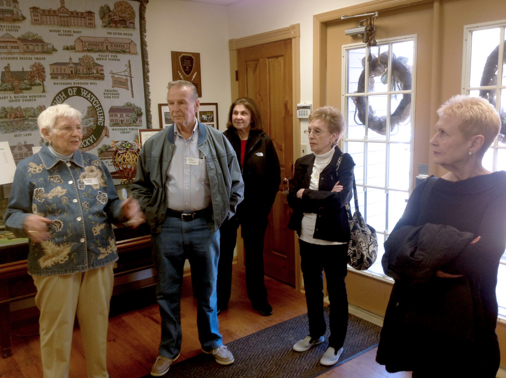 (above) Shows Barbara Diem (left), Chairperson of the Watchung Historical Committee, speaking to seniors about Watchung history.