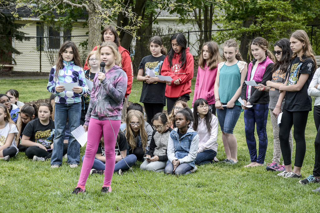 (above) Park Middle School students read warnings about the Emerald Ash Borer, a pest plaguing ash trees in New Jersey.
