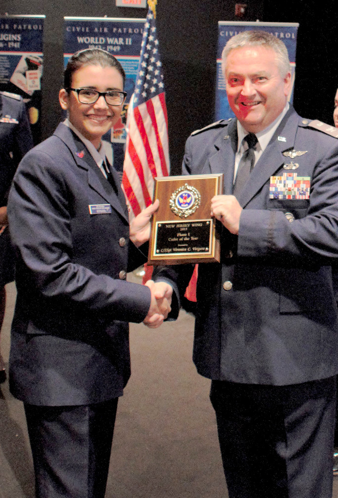 (above, l-r) Scotch Plains resident, Cadet Staff Sergeant Veronica Vergara, was presented with the “Phase One Cadet of the Year” award for the New Jersey Wing from Colonel Steven Tracy.