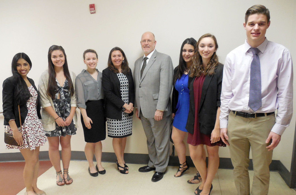 (above) Standing on either side of guest speaker Amanda Seewald, fourth left, president of the Foreign Language Educators of New Jersey, and Brad Commerford, supervisor of World Languages at WHRHS, are students (l-r) Senior Anjali J. Patel of Warren Township; senior Olena Alexandra Hadlet of Millington; junior Arielle Ostry of Green Brook Township; junior Sonali Howe of Green Brook Township; senior Jenna Charko of Warren; and senior Lukas Ihringer of Gillette. Sonali Howe, was inducted into two language honor societies, Latin and Spanish.