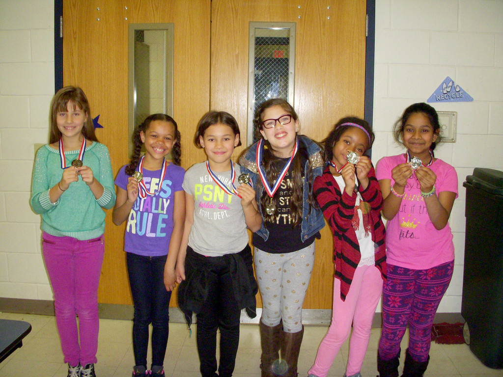(above l-r) The second place team winners of Battle of the Books: Victoria Komperda, Madison Bracey, Jade Wong, Giselle DoCarmo, Mariel Woodson, and Anisha Subramanie.
