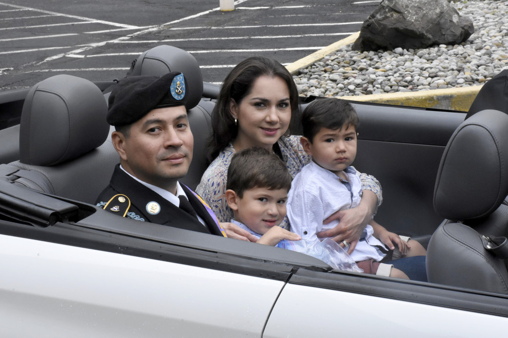 (above) Grand Marshall was Sergeant Carlos Granados with his wife Leidy Varon, and sons Esteban and Matthew.