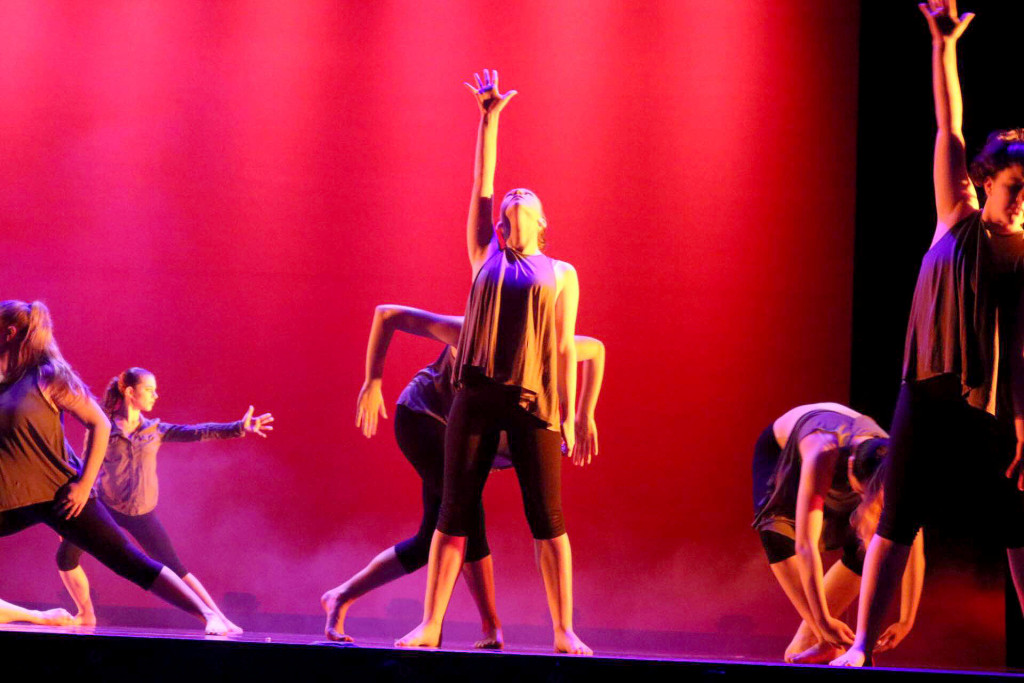(above) Members of the WHRHS Dance Ensemble perform the piece, Collateral Damage, choreographed by senior dance student Lauren Loesberg. The photo was by one of the 17 dancers in the piece, Ally Manspiezer.