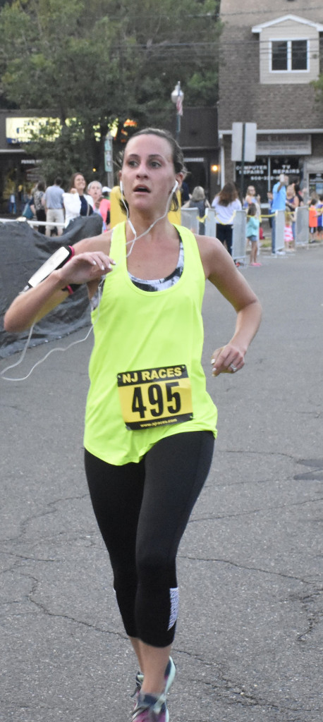 (above) Melissa Cerimele, age 31, finished first in the female category at 19 minutes 21.
