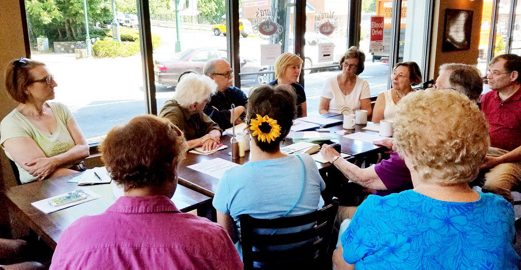 (above) Mayor Colleen Mahr discusses current community issues with several local residents.