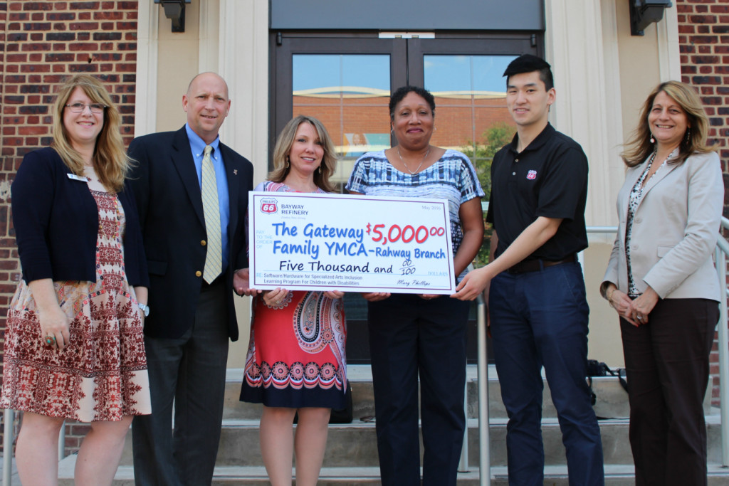 (above) Derek Chiao, Phillips 66 Bayway Refinery Engineer and YMCA Board Member, along with Mary Phillips, Phillips 66 Bayway Refinery Community Relations Coordinator presented the $5,000 donation to Krystal R. Canady, Chief Executive Officer, Melynda Mileski, Executive Vice President/COO, Rodger Koerber, Rahway Branch Executive Director, and Lara Kennedy, Arts Director at The Gateway Family YMCA - Rahway Branch, 1564 Irving Street, Rahway.