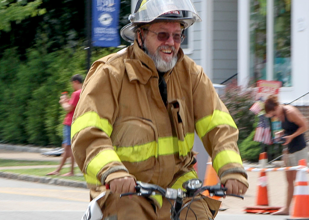 (above) Kenneth Larson Green Brook Fire EMS at finish line. Larson was presented with the “Oldest Firefighter Racer Award” this summer at the 20th annual NJ Firefighters Bicycle Race to raise funds for The Burn Center at St. Barnabas Hospital.