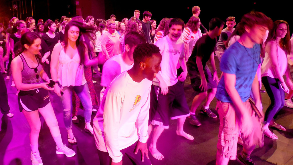 (above) For the grand finale to Dancing With The Teachers, all were invited, including the audience, to get up on stage to participate in the last dance number, the currently popular funky line dance, “The Cha Cha Slide.”