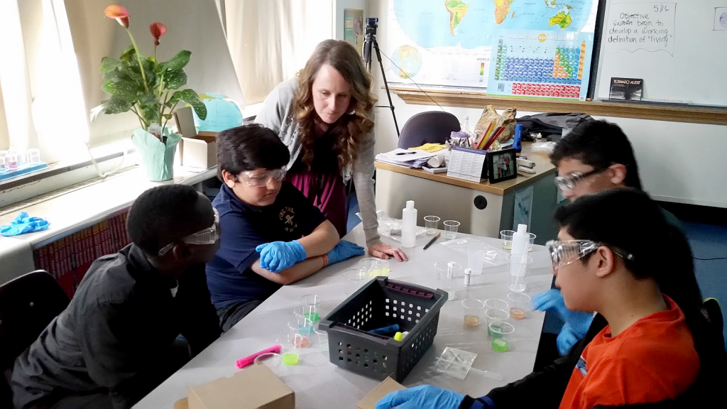 (left) McKiethen, Syed, Richie, and Marlon are being guided through the lesson by Mrs. Nicole Brighouse.