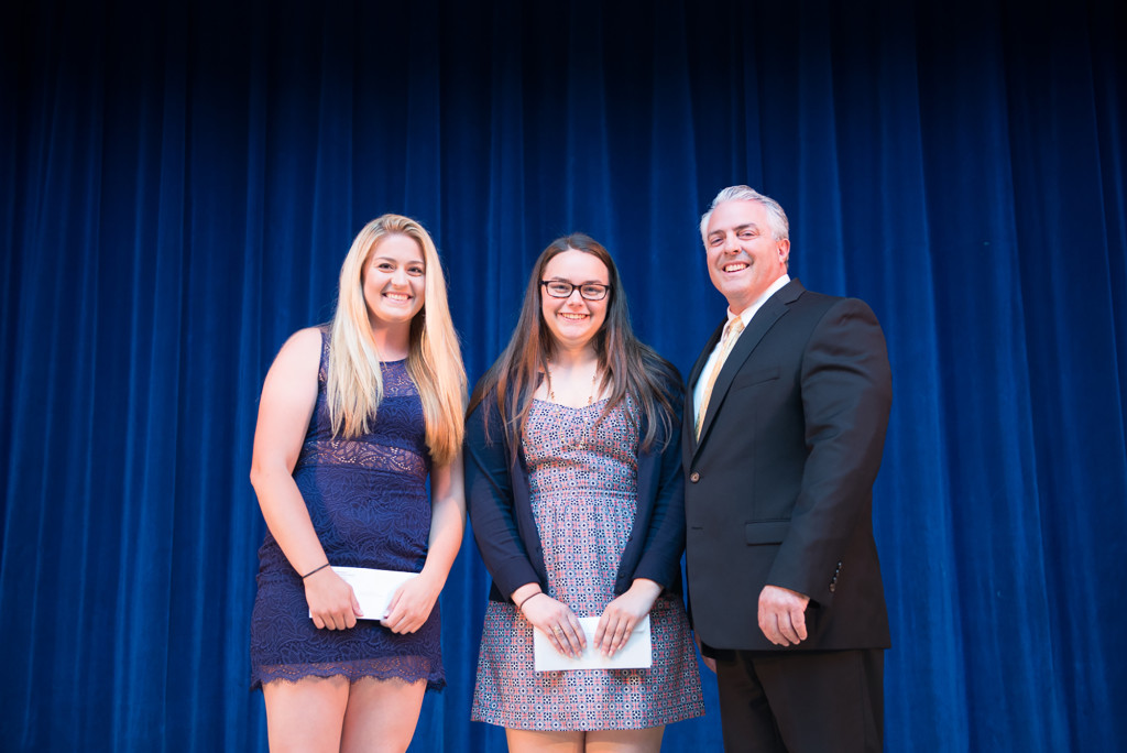 (above) Principal Rick Delmonaco presents Leslie Bartell Scholarships to Stephanie Visconti and Kristen Adamowitz