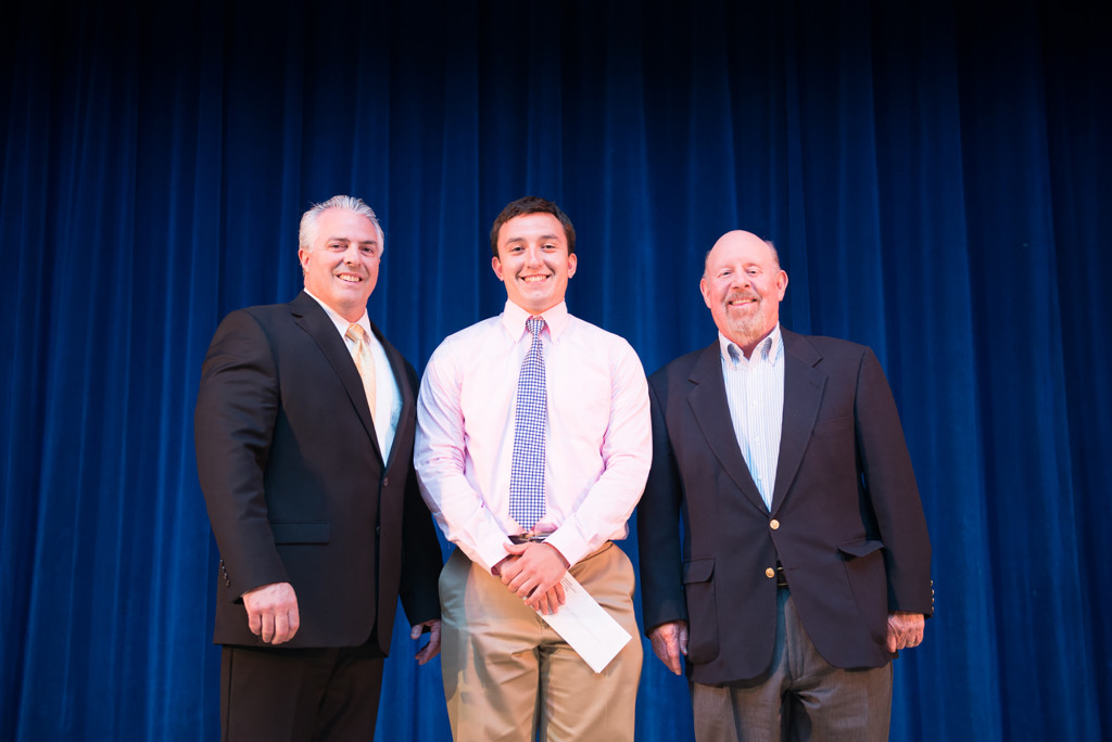 (above) Principal Rick Delmonaco and former ALJ teacher Jack Ford present the Leslie Bartell Scholarship offered in the name of Jack Ford to Wesley Giannobile