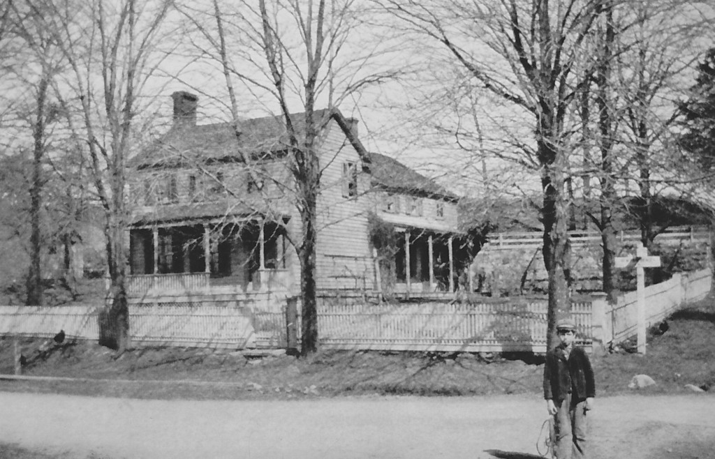 (above) A vintage photo of the Levi Cory house as it appeared in the early 1900s. Recently, the bow window was removed from the Levi Cory house and replaced with siding to restore it to its original appearance.