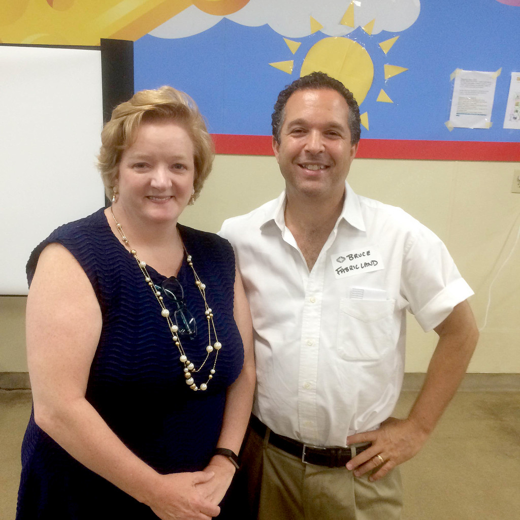 (above l-r) Guest speaker Susan Wicox, and Bruce Hyman, President of Fabricland.