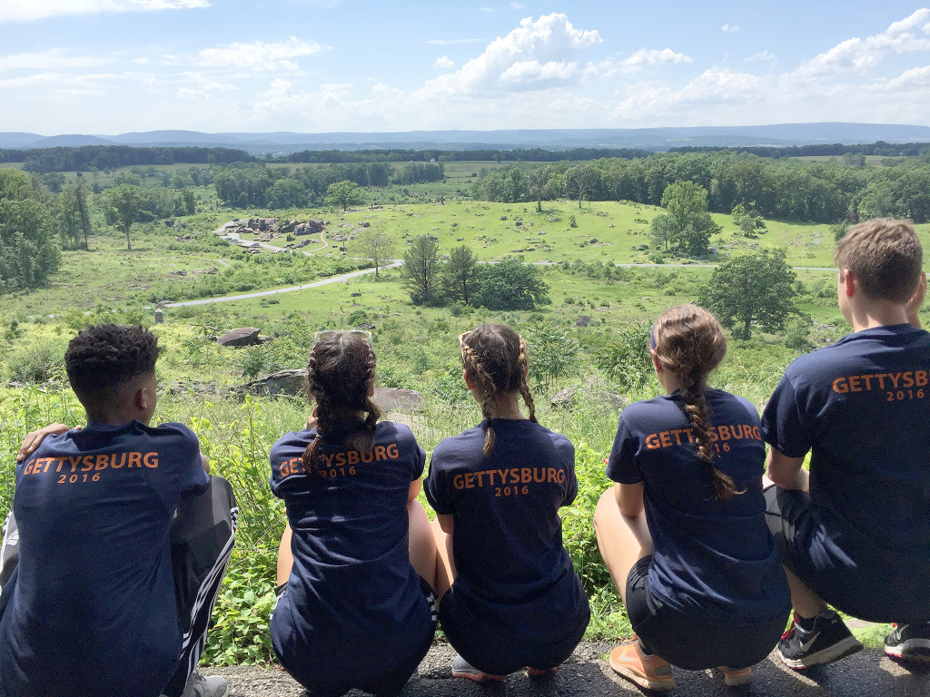 (above) Believing that the best way to learn history is to experience it, thirty-one students and 4 chaperones of the Linden High School Civil War Roundtable recently traveled to the Gettysburg National Battlefield Park in Gettysburg, PA. This location was the site of the 1863 Battle of Gettysburg, the largest battle of the American Civil War, and President Abraham Lincoln’s Gettysburg Address. This is the ninth year that the club has made the journey and the second year that the students stayed overnight. On Monday June 6th, escorted by Club Advisor Mr. Eric Scheidemann, Mr. Paul Gorski, Mrs. Monica Goncalves, and Ms. Melanie Calatayud, the students toured the town of Gettysburg, the battlefield and the Gettysburg National Cemetery where President Lincoln gave his famous address, they also participated in a walking tour that highlighted the “haunted” history of the area. The students also toured the Gettysburg battlefield. Directed by Mr. Scheidemann, the students visited famous locations on the field such as Cemetery Hill, the Lutheran Seminary, Devil’s Den, and Little Roundtop, all critical areas and scenes of heavy fighting in July of 1863.