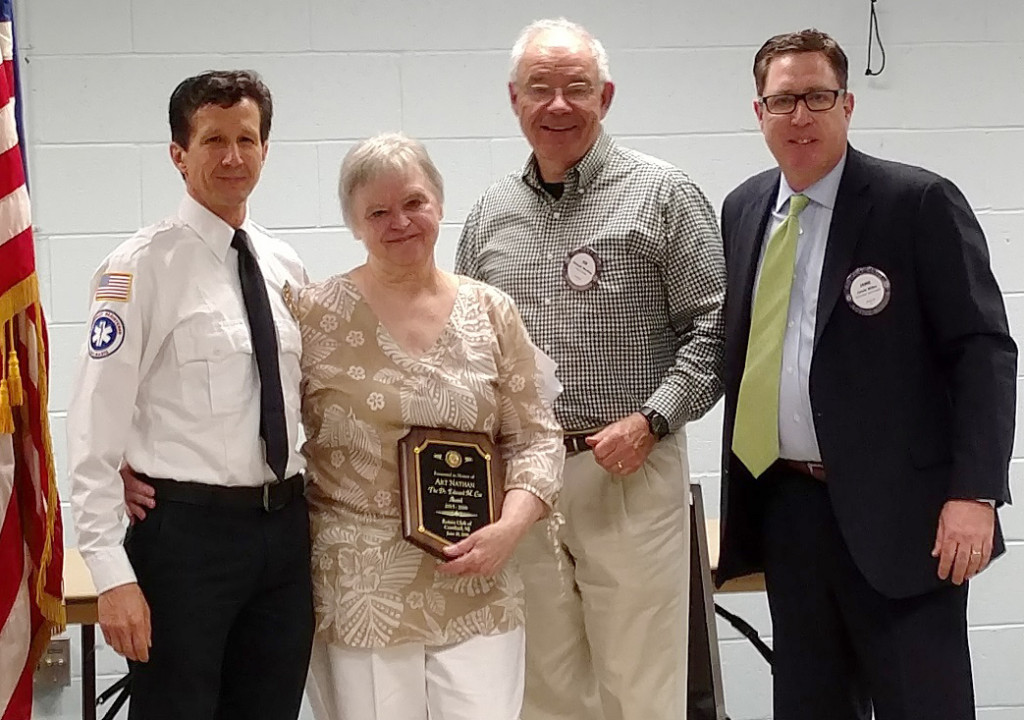 (above) Rotary President Joe Starkey (second from right) and Rotary Vocational Awards Committee Chair Jamie Miller (far right) present Coe Award to First Aid Squad Captain Kent Lucas (far left) and Joan Nathan.