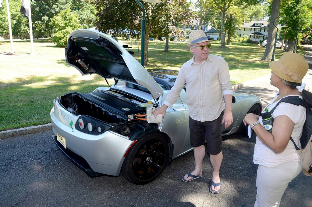 (above) Michael Thwaite of Warren exhibited his 2010 Tesla Roadster to the Fanwood Green Fair. It is the first all-electric consumer car made by Tesla. Even after 6 years on the road, it gets 240 miles per charge, goes 0-60 in less than 4 seconds and gets up to 120 MPH.
