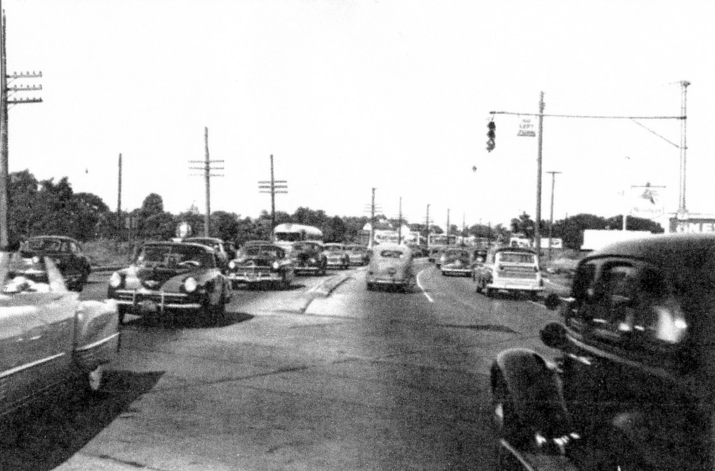 (above) In the 1930s, signs like the one at the intersection of Irving Street and Grand Avenue were placed at many intersections reminding motorists to slow down.