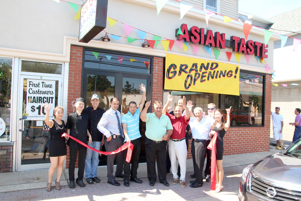 (above, l-r) The staff of Asian Taste Restaurant, located at 33 Westfield Avenue, in Clark, flank Clark VIPs at their Grand Opening: (starting third from left) Pedro Matos, Chief of Police; David Guo, Owner Asian Taste; Mayor Sal Bonaccorso; Mike Khoda, Construction Officer; Vincent Concina, Police Captain; John Laezza, Business Administrator; and Richard O’Connor, Engineer.