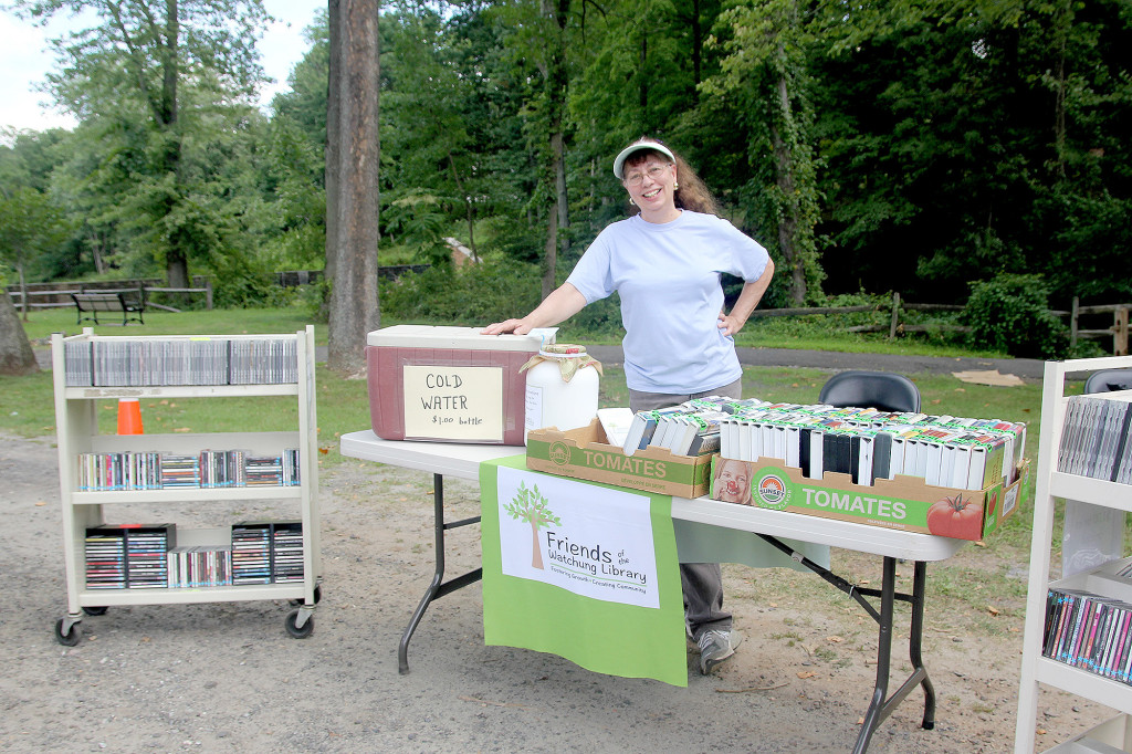 (above) Volunteer Peggy Ellis manning the table