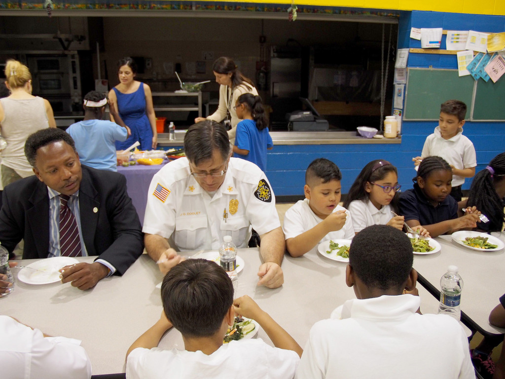 (above) Linden Mayor Derek Armstead, Linden Fire Chief Josheph Dooley, Nicholas Herrera, Aylin Acosta, and Aamira Williams eat their "Friendship Salad" together and discuss the importance of healthy eating habits.