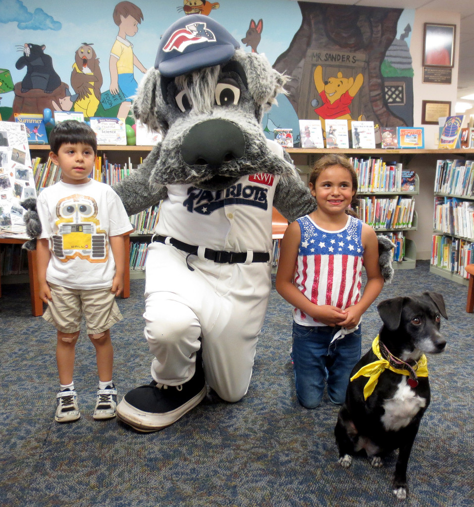 (above) Children visited with Tracy, the unofficial mascot of the Kenilworth Public Library, and Sparkee the mascot of The Somerset Patriots.