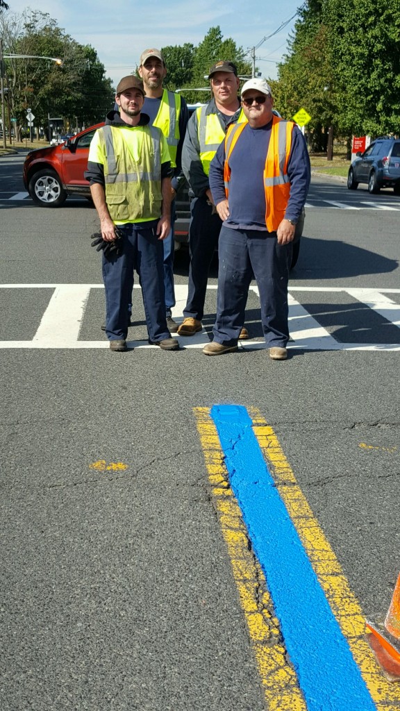 (right) Kenilworth Department of Public Works painted a blue line down the Boulevard in support of the Kenilworth Police Department as well as all law enforcement officers.