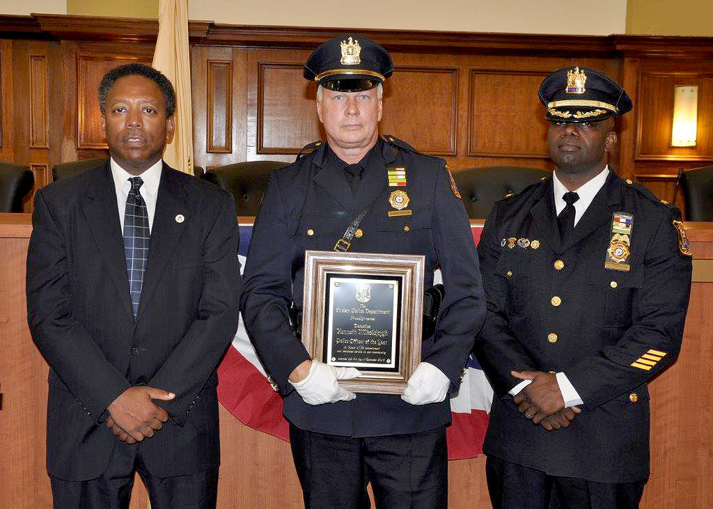 (above l-r) Mayor Derek Armstead, Detective Kenneth Mikolajczyk, and Chief Jonathan R. Parham.