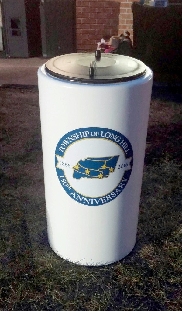 (above) The Long Hill Township Time Capsule buried at Town Hall to be opened 50 years from now on the 200th Anniversary of the Township.