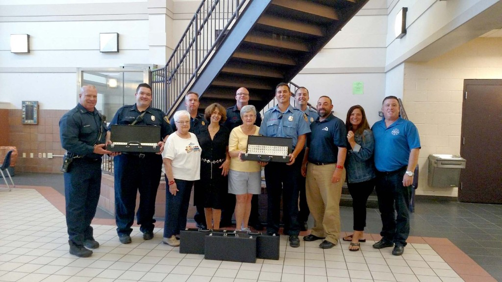 (above) Cranford  Firefighters: B.C. Schaeffer, Lt Dillon, FI Bagniewski, FI Hannen, FF Meyer, FF Kniazuk , NJFMBA President Eddie Donnelly, Stephen P. Robertazzi, Director Of Cranford Recreation and Parks/Swim Pool Utilities, Lori-Ann Donnelly, Senior Citizen Program Coordinator and grateful seniors Rosalie, Cecilia and Irene.